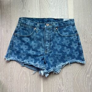 Texas print cutoff jean shorts with ACL Fest branding